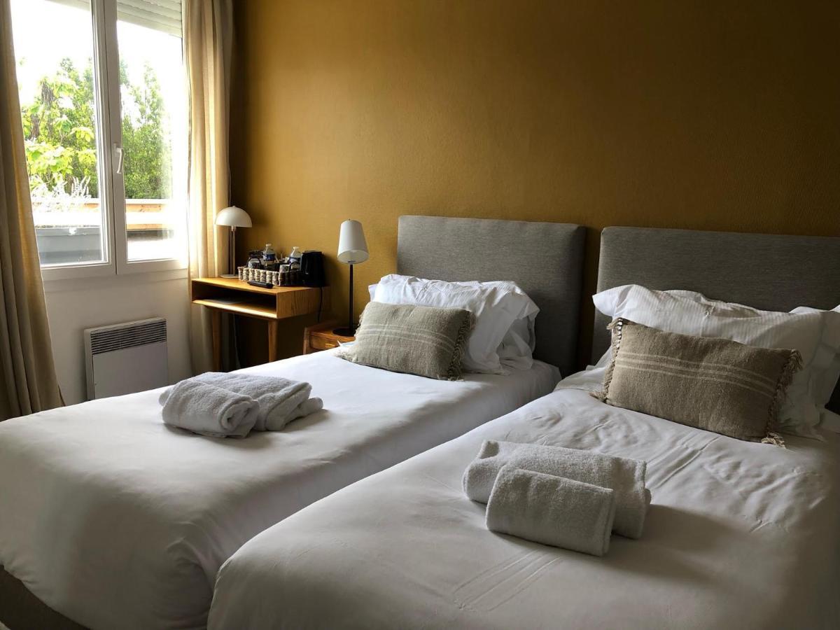 Le Homard Bleu Hotel แซ็ง-โทรจง-เลส์-แบ็งส์ ภายนอก รูปภาพ